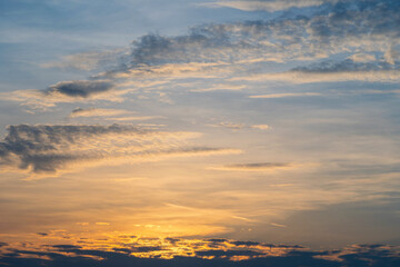 Fototapeta premium Colorful sunset with clouds in the evening, Fantastic view of the dark overcast sky. Dramatic and picturesque morning scene, Panorama of a textured purple sky at sunset
