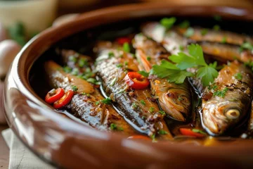 Foto auf Acrylglas Pickled sardines in balsamic sauce with garlic chili and bay leaf © VolumeThings