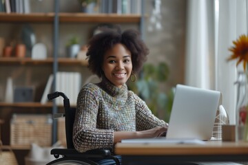 Smiling Woman in Wheelchair Using Laptop