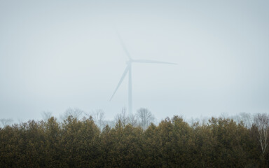 Wind turbine in the fog.