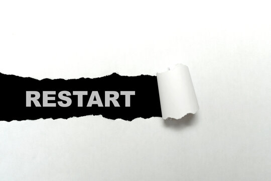 Ripped paper with restart text