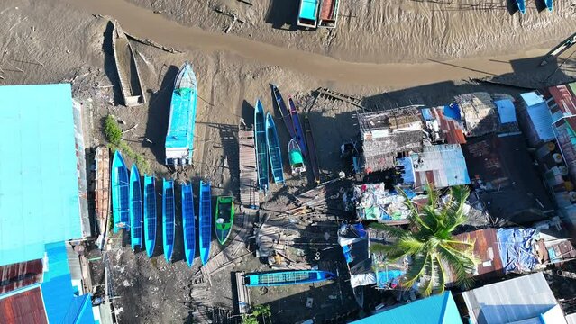 boats and residential areas with rivers at low tide make boats for sailing in asmat papua indonesia