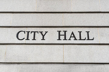 City hall sign on granite building wall in downtown Los Angeles California.  