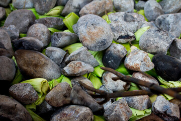 Photograph of preparation of the traditional Pachamanca in Peru. Typical dish from the Andes of Peru.
