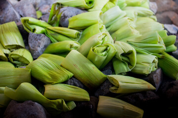 Obraz premium Photograph of preparation of the traditional Pachamanca in Peru. Typical dish from the Andes of Peru.