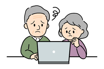 パソコンを操作して悩むシニアの夫婦