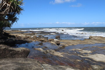 Rocky beach flats and ocean