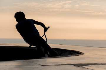 Freestyle cyclist practicing street BMX