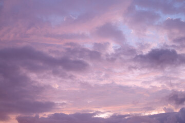 Texture of purple clouds at sunset. Beautiful sky background