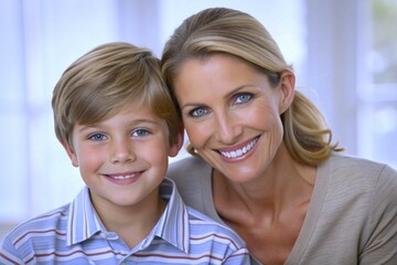 mom and son smiling: happy mother and son look at camera; mother's love