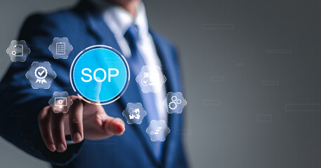 SOP, Standard operating procedure concept. Businessman touch virtual SOP icons for the standard...