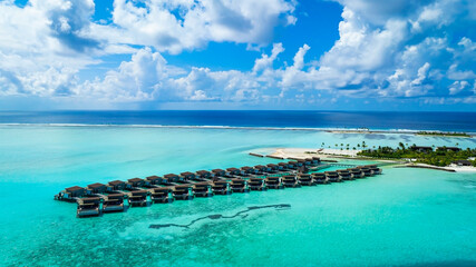 Tropical aerial view with maldives paradise scenery seascape with water villas as amazing sea and...