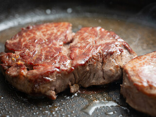 grilled steak on a grill