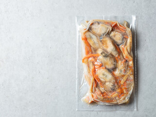 Frozen packaged oysters and stir-fried vegetables