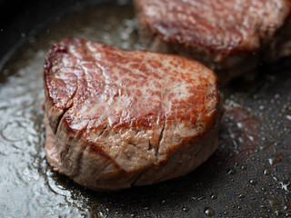 Steak grilled in an iron pan
