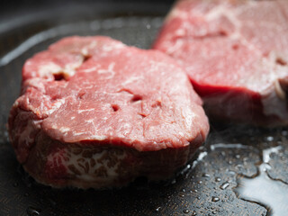 Steak grilled in an iron pan