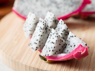 dragon fruit on wooden plate