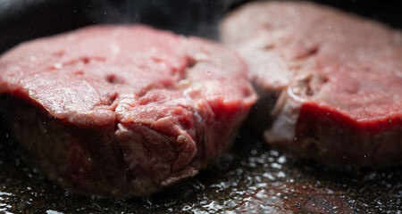 Steak grilled in an iron pan	
