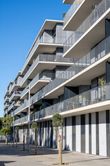 Modern gray apartment buildings seen in Badalona, Spain