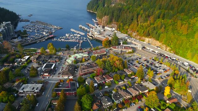Aerial view on Horseshoe Bay, houses, nature and car queue on the ferry