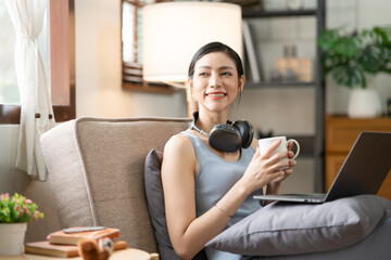 Asian woman doing activities, reading books, shopping online order through the internet at home or in the office during the holidays