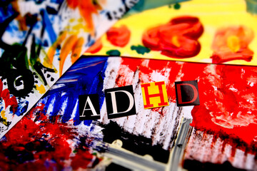 ADHD text. Abbreviation ADHD from paper letters . Colorful art background. ADHD is Attention deficit hyperactivity disorder - obrazy, fototapety, plakaty