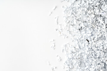Shredded paper on white background close up