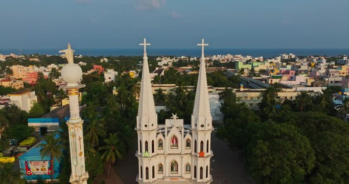 Backward shot of Sts. Joachim and Anne Church during daytime in Chennai, India. Aerial view.