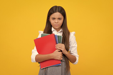 School child with book. Learning and education. Angry teenager schoolgirl, upset and unhappy negative emotion.