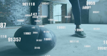 Image of floating numbers over man exercising with a ball