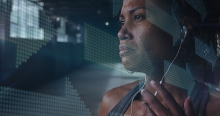 Digital composite image of multiple arrows moving against african american woman wearing earphones - Powered by Adobe