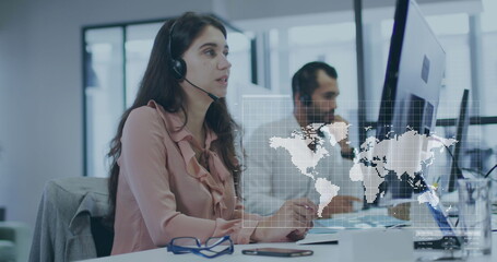 Image of data processing and world map over diverse business people in office