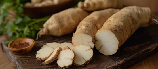 The skin of lesser yam root is tough to peel but becomes tender when cooked.