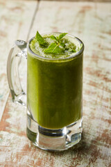 Lemon with mint mojito served in glass isolated on table top view of arabic food