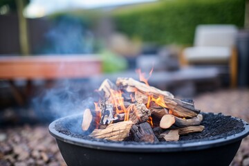 close-up of fire pits hot coals and crackling wood