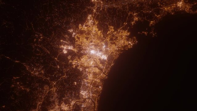 Sendai (Japan) aerial view at night. Top view on city from space. Camera is zooming in, rotating clockwise