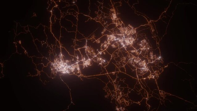 Abha (Saudi Arabia) aerial view at night. View on modern city from space. Camera is zooming in, rotating counterclockwise