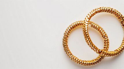 Top view of two golden bracelets