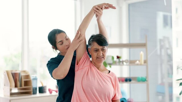 Physical therapy, stretching arm or mature woman in exercise for health, wellness or healing pain. Physiotherapy, patient or medical professional help for rehabilitation, support or injury recovery