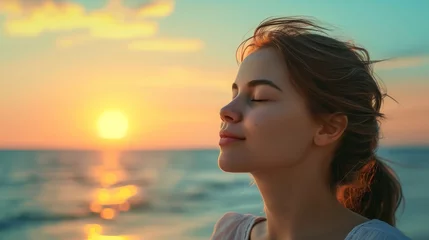 Foto op Plexiglas Sunset beach, woman with eyes closed, enjoying summer breeze © Lucija