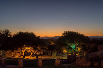 after sunset light at lodge garden in desert, near Hobas,  Namibia