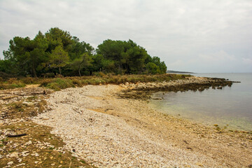 The rugged limestone coast of Kamenjak National Park on the Premantura peninsula of Medulin, Istria, Croatia. December