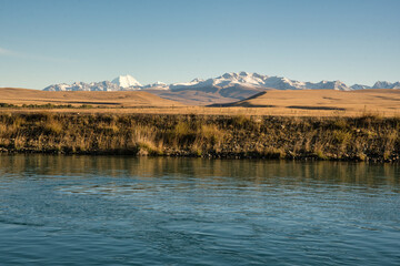 Rural MacKenzie country hydro canal and rural agricultural scenery
