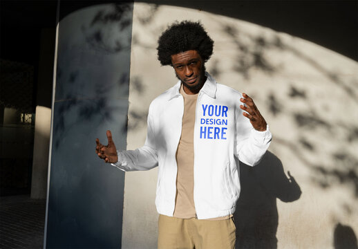 Mockup of man wearing customizable jacket, gesturing