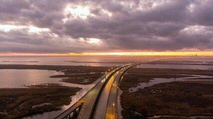 Foggy evening over Jubilee Parkway on Mobile Bay