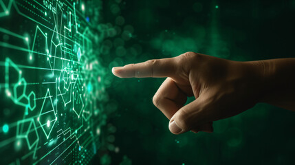 Hand finger pointing at a green technology screen with geometrical abstract shapes, future business technology virtual reality VR augment reality AR interface concept - obrazy, fototapety, plakaty