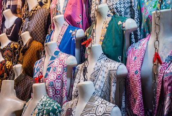 Traders sell various batik clothes with various motifs at Beringharjo Market, Jogjakarta,...
