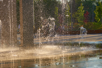 Cool water fountains flow in the summer heat