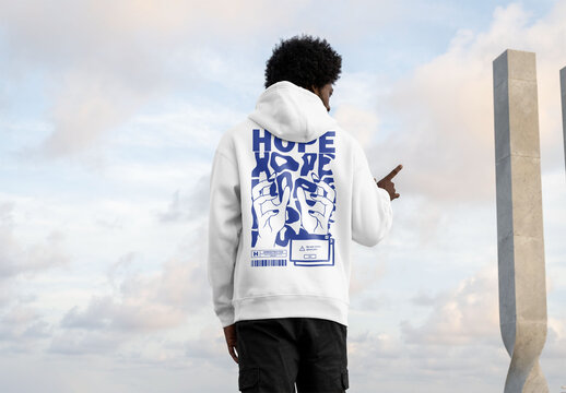 Mockup of man wearing customizable hoodie, rear view