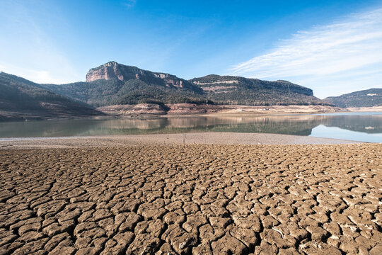 Desolate landscape of dry and broken land in the Sau reservoir, Panta de Sau, due to the greatest drought in Catalonia in history
